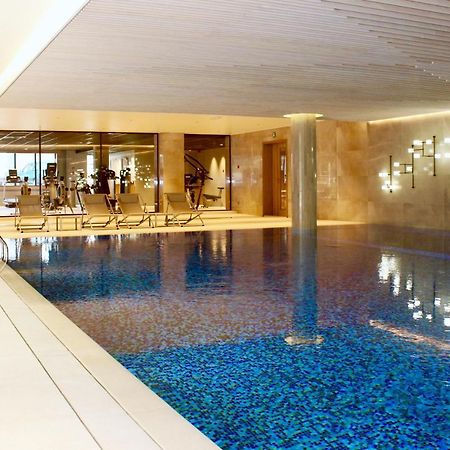 Tangla Hotel Brussels Kraainem Exterior photo The swimming pool at The Landmark