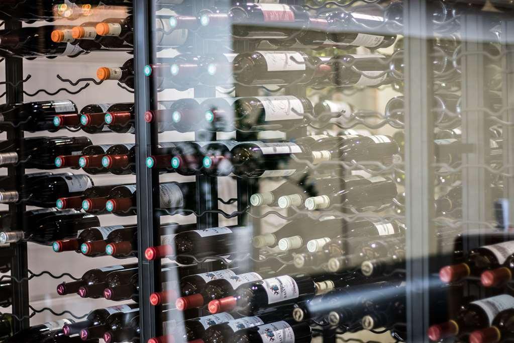 Tangla Hotel Brussels Kraainem Restaurant photo Wine bottles in a wine rack